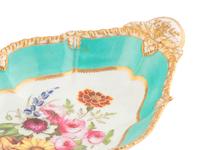 An English Porcelain Dessert Stand and Sauce Tureen