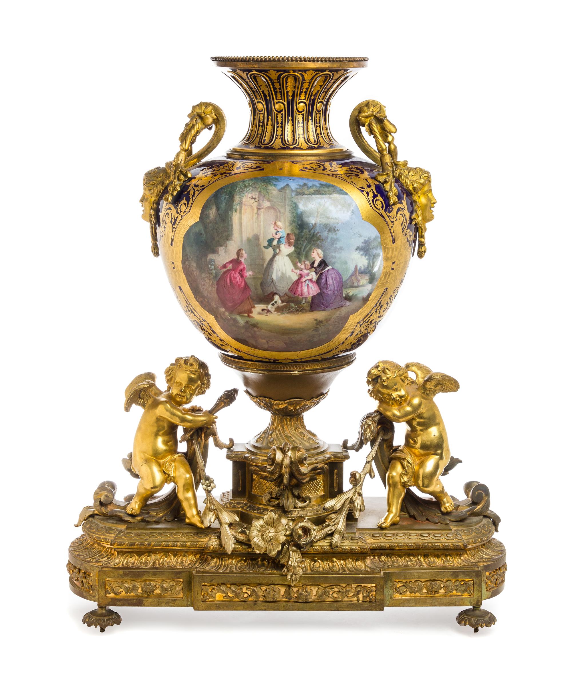 A Sevres Style Gilt Bronze Mounted Porcelain Urn Height 30 1/4 inches. — 19TH/20TH CENTURY