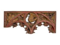 A Gothic Style Painted and Parcel Gilt Relief Panel