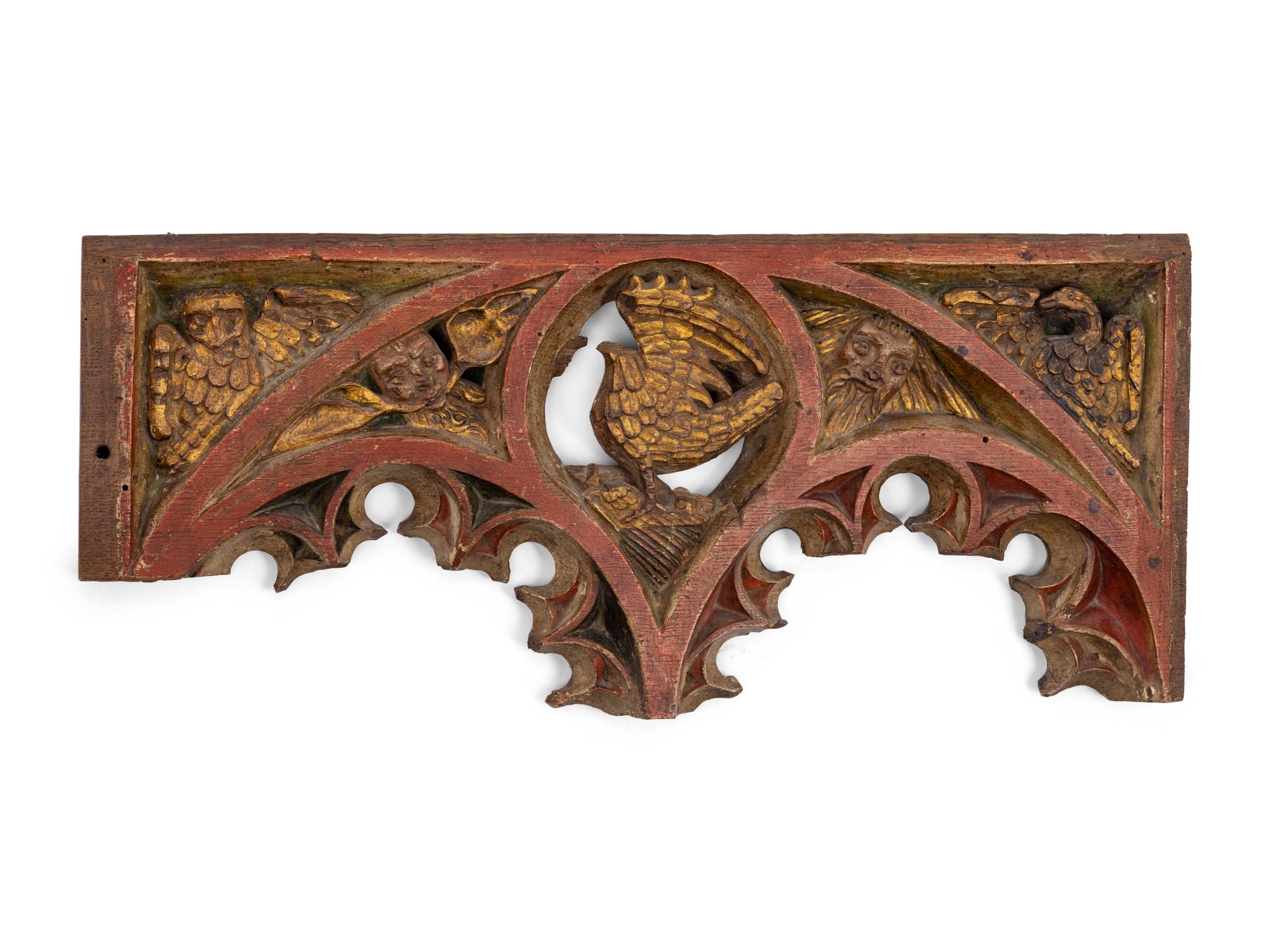 A Gothic Style Painted and Parcel Gilt Relief Panel