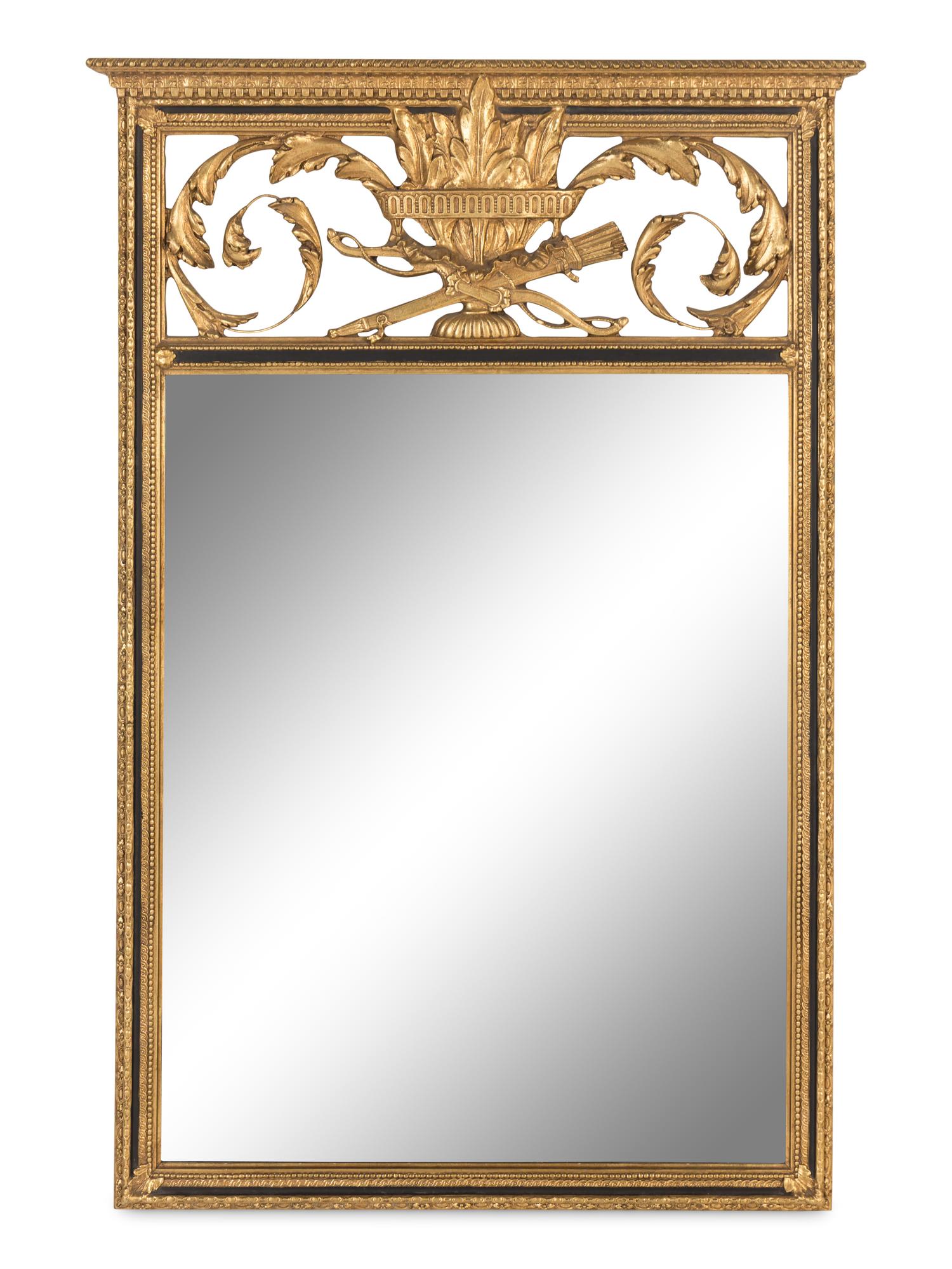 An Empire Style Giltwood and Parcel-Ebonized Mirror