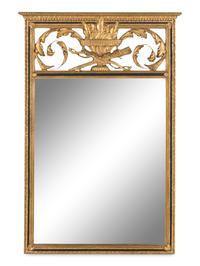 An Empire Style Giltwood and Parcel-Ebonized Mirror