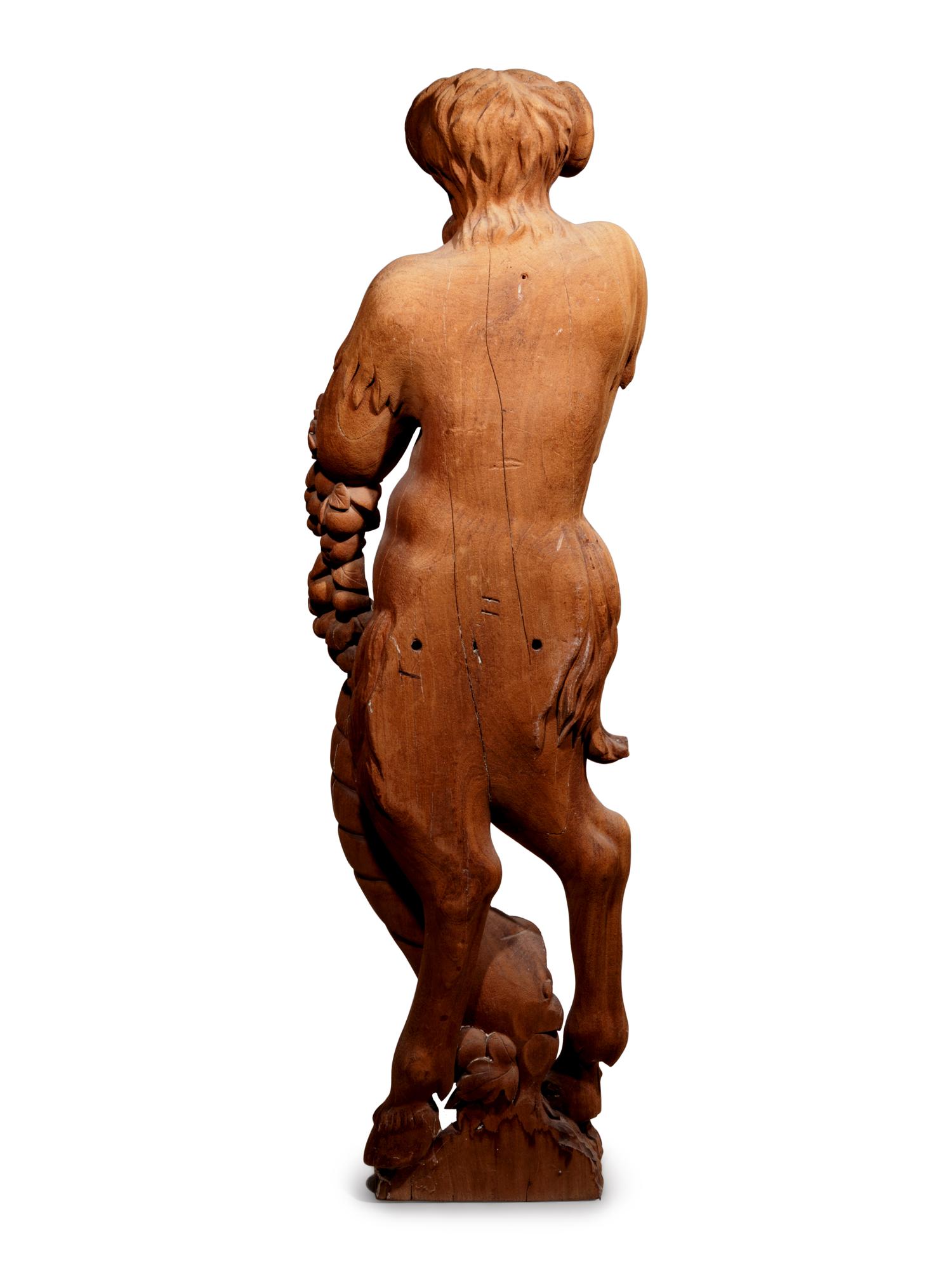 Two Continental Carved Wood Bacchic Figures of a Satyr and Satyress