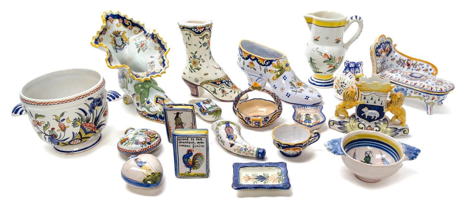 A Collection of Quimper Pottery Articles Height of tallest boot form vessel 7 3/4 inches.