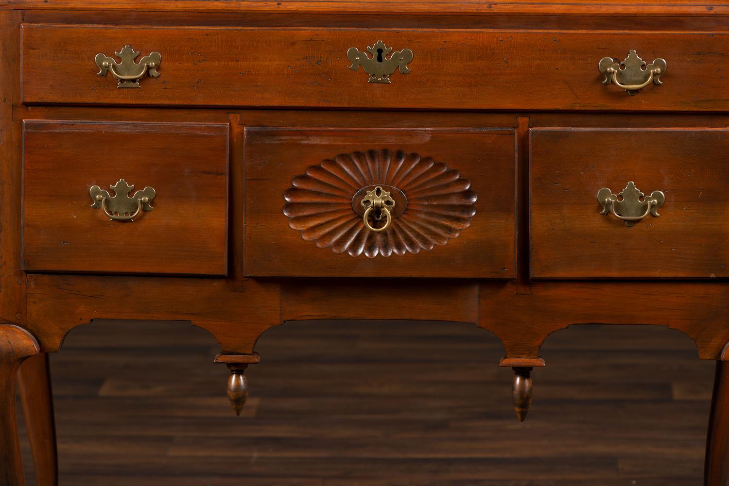 A Queen Anne Fan-Carved Cherrywood Bonnet Top High Chest