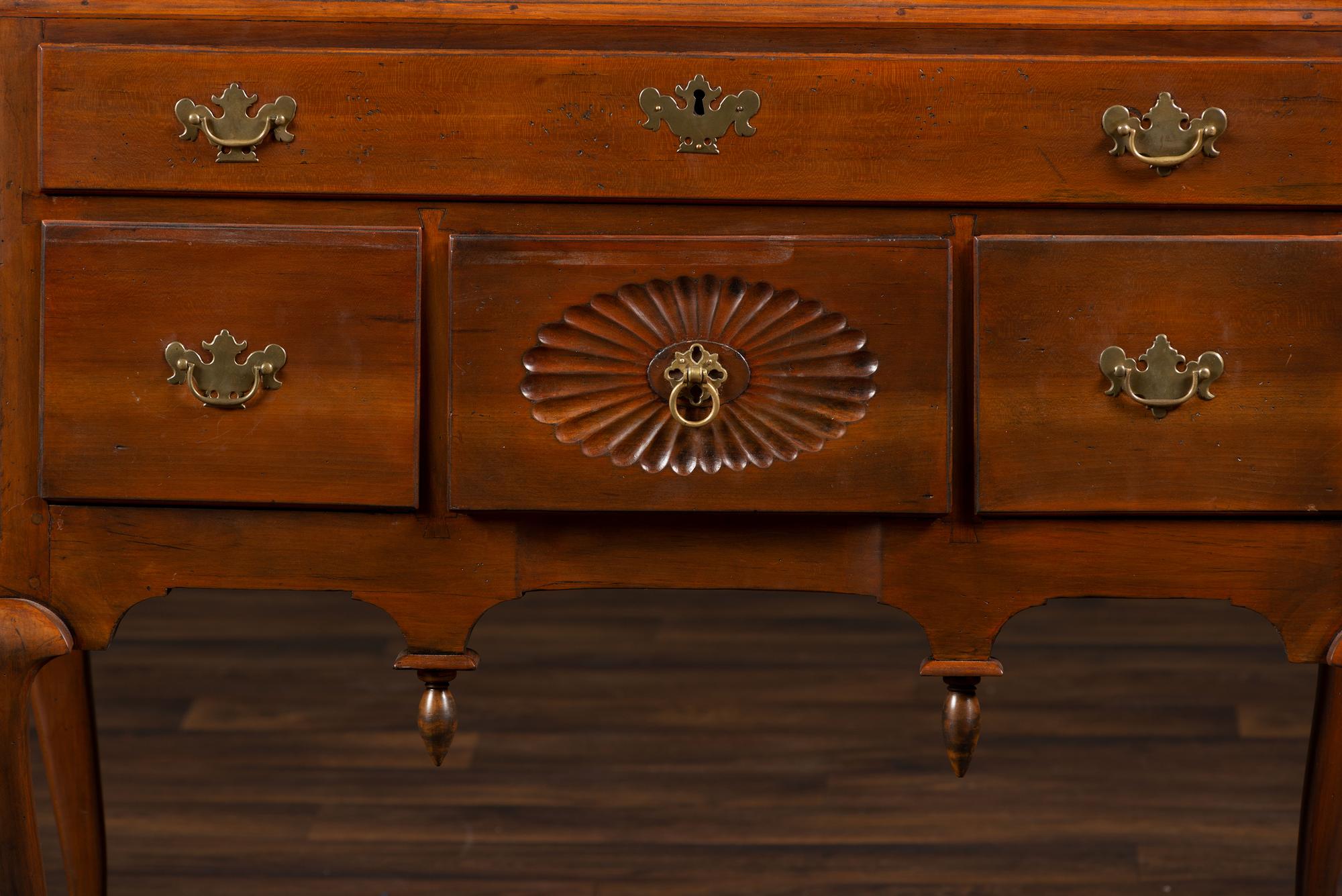 A Queen Anne Fan-Carved Cherrywood Bonnet Top High Chest