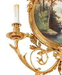 A Pair of Large Louis XV Style Gilt Bronze and Porcelain Two-Light Sconces
