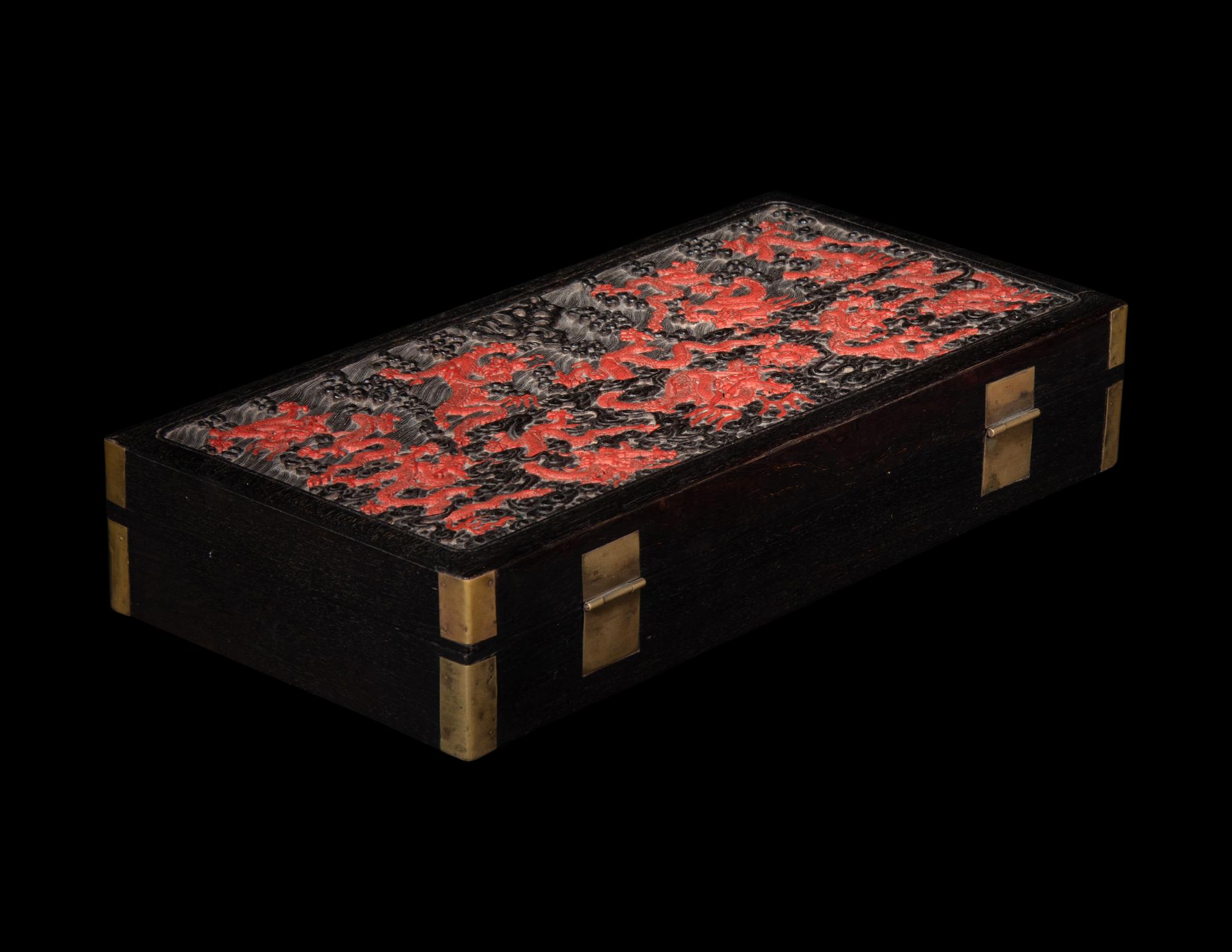 A Chinese Carved Red and Black Lacquer 'Dragon' Document Box