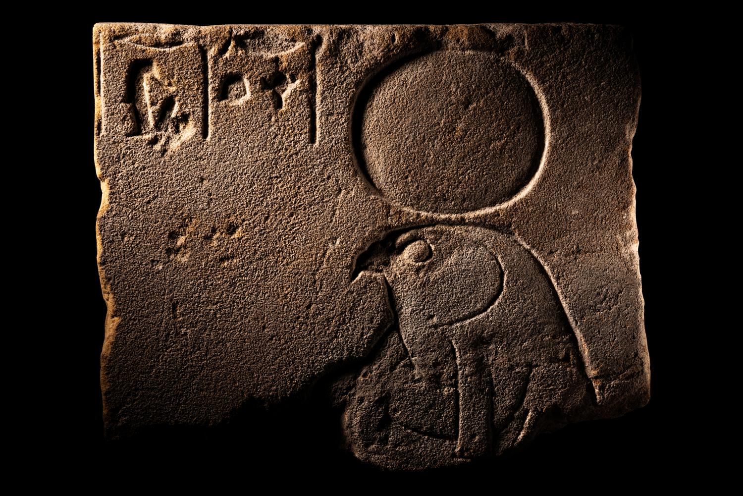An Egyptian Sandstone Relief of Horus