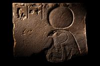 An Egyptian Sandstone Relief of Horus