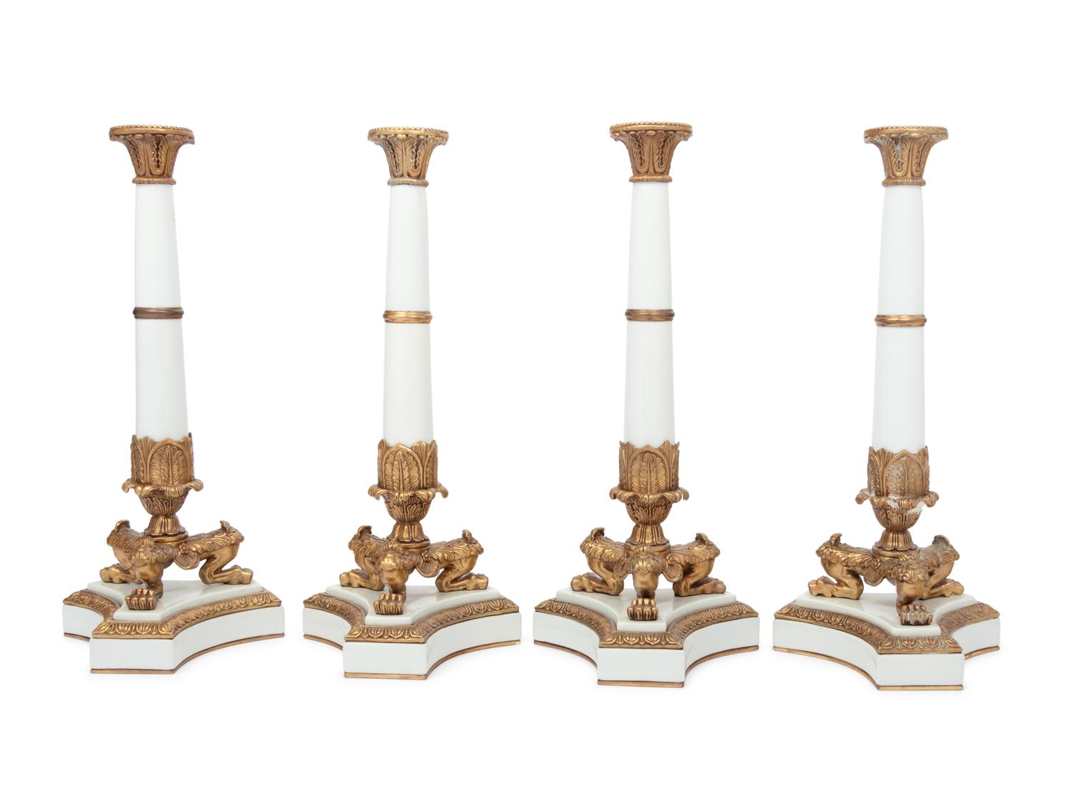 A Set of Four Contemporary Empire Style Gilt Metal Mounted Porcelain Candlesticks