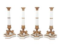 A Set of Four Contemporary Empire Style Gilt Metal Mounted Porcelain Candlesticks