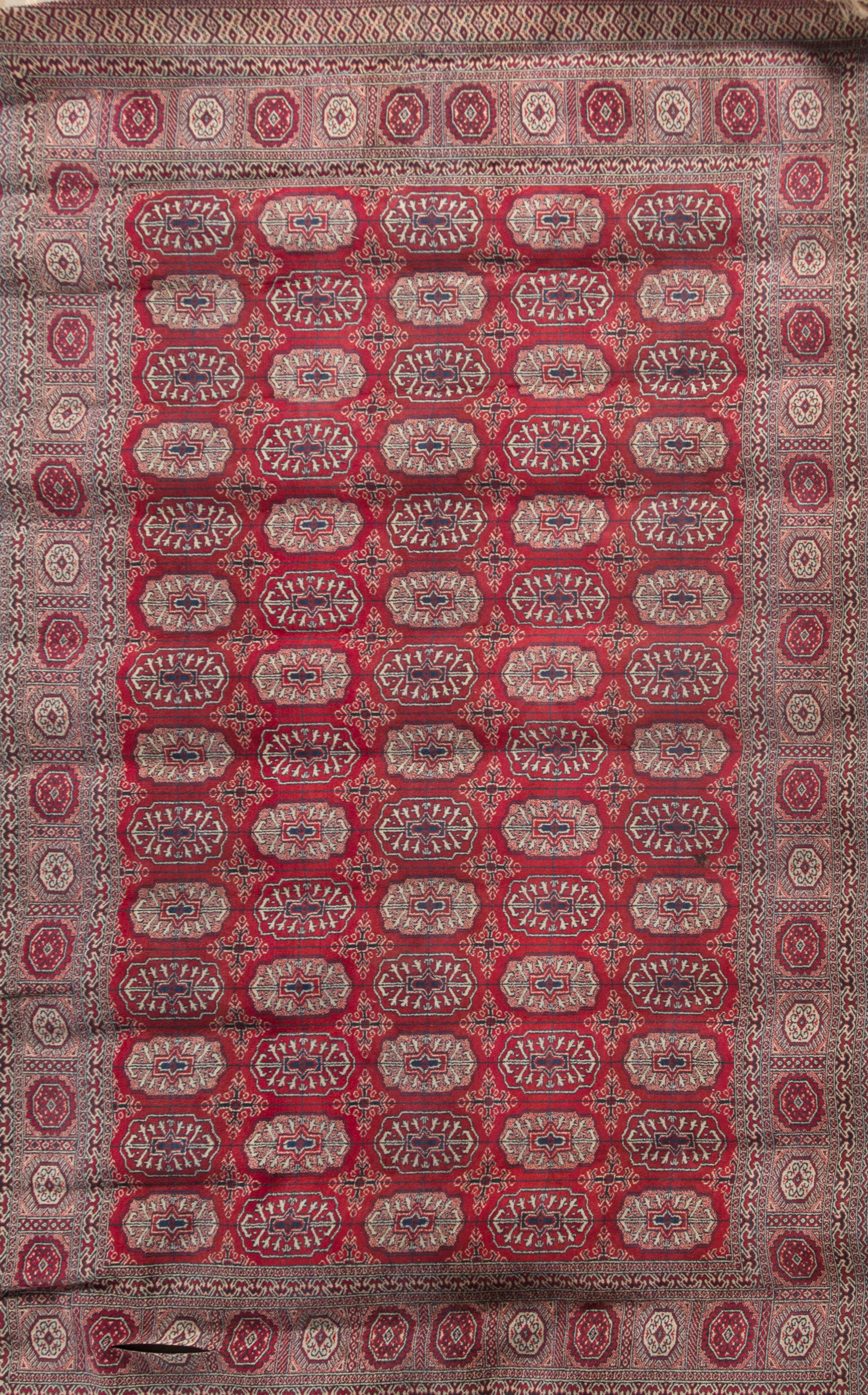 A Shiraz Wool and Silk Rug 7 feet x 4 feet 7 inches.