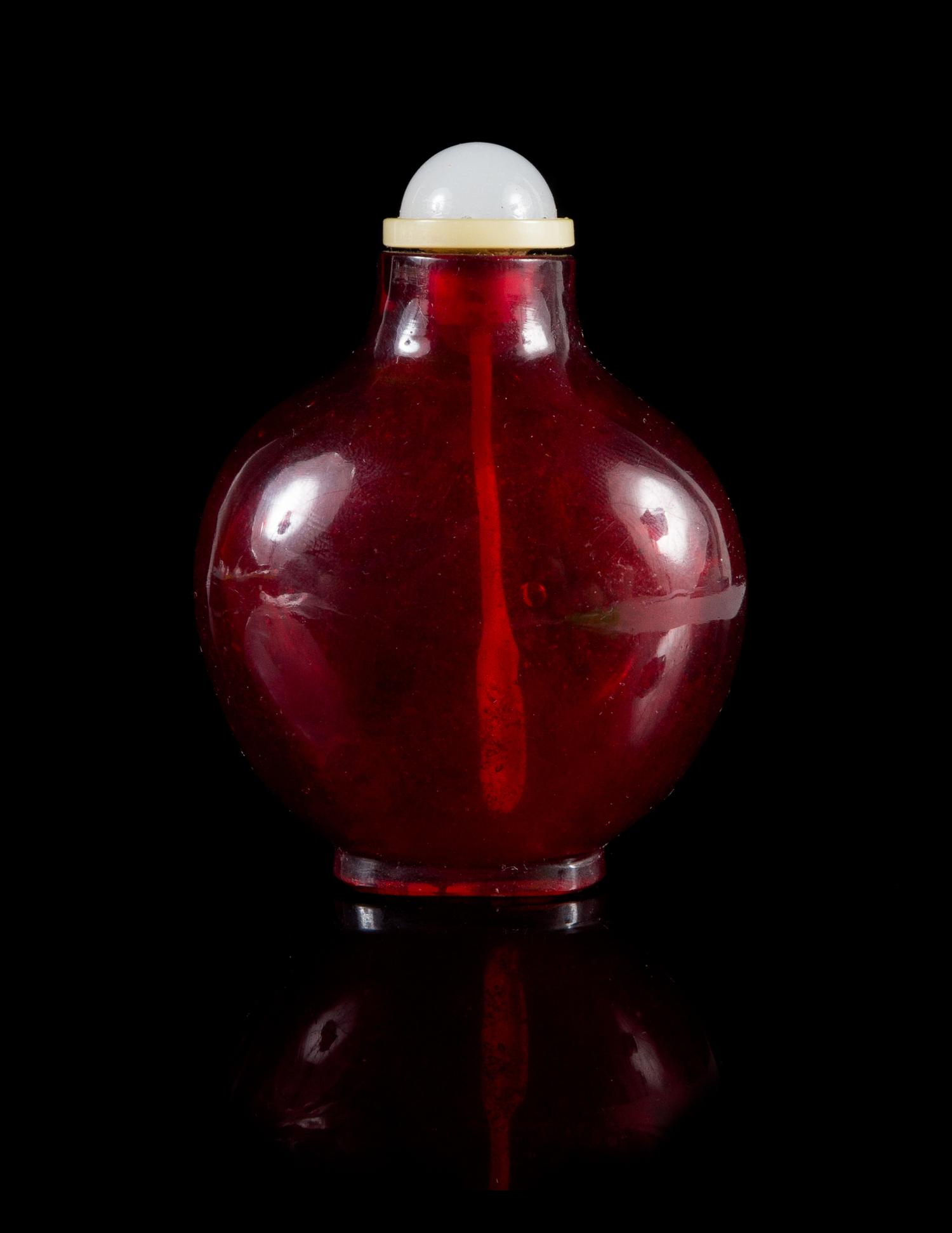 A Red Peking Glass Snuff Bottle Height 3 inches.