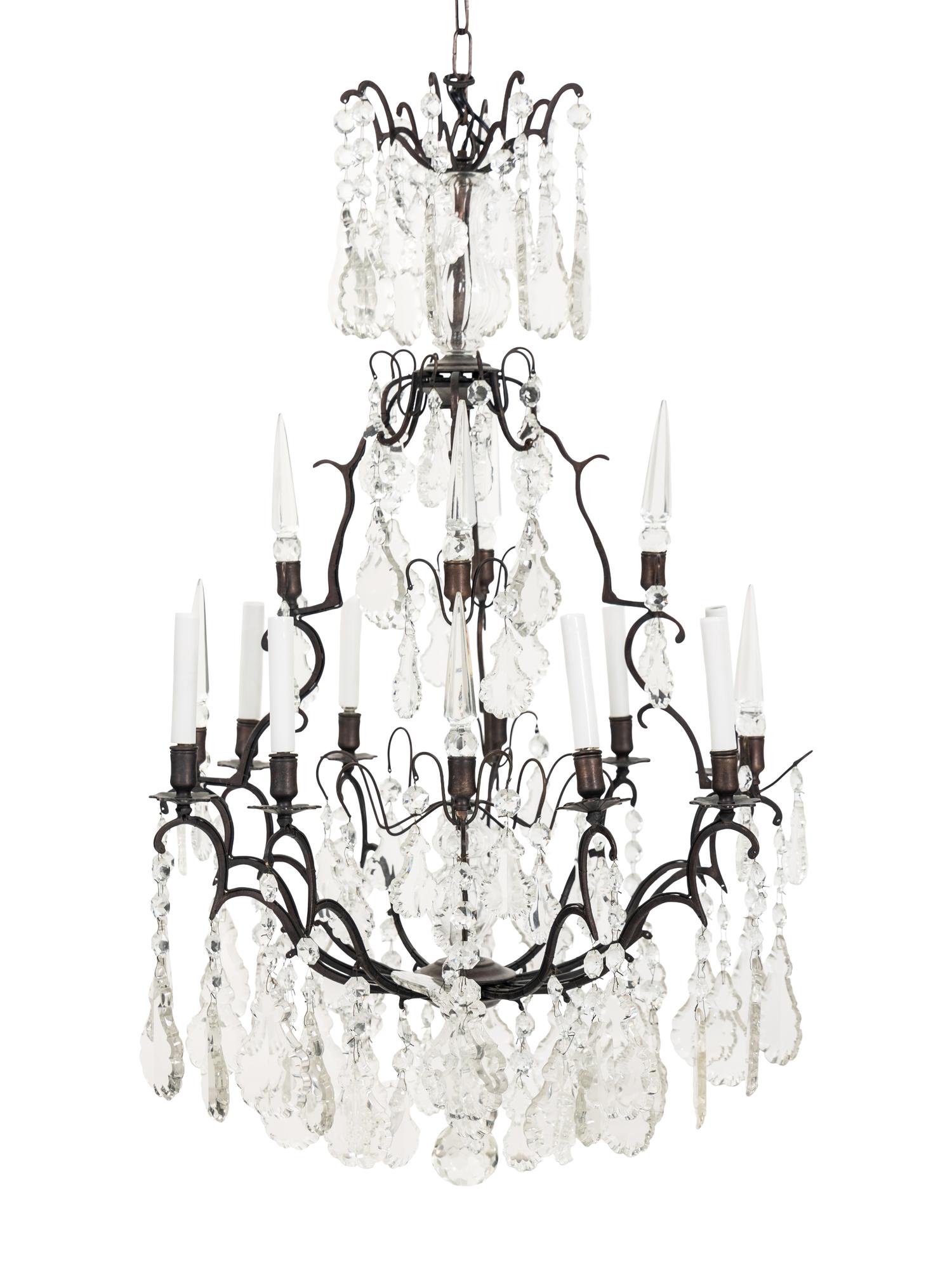 An Iron and Glass Eight-Light Chandelier