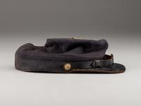 [CIVIL WAR]. A collection of items identified to brothers Robert and Samuel Burnside, Company H, 110th New York Infantry, comprised of a kepi and war-date photographs.