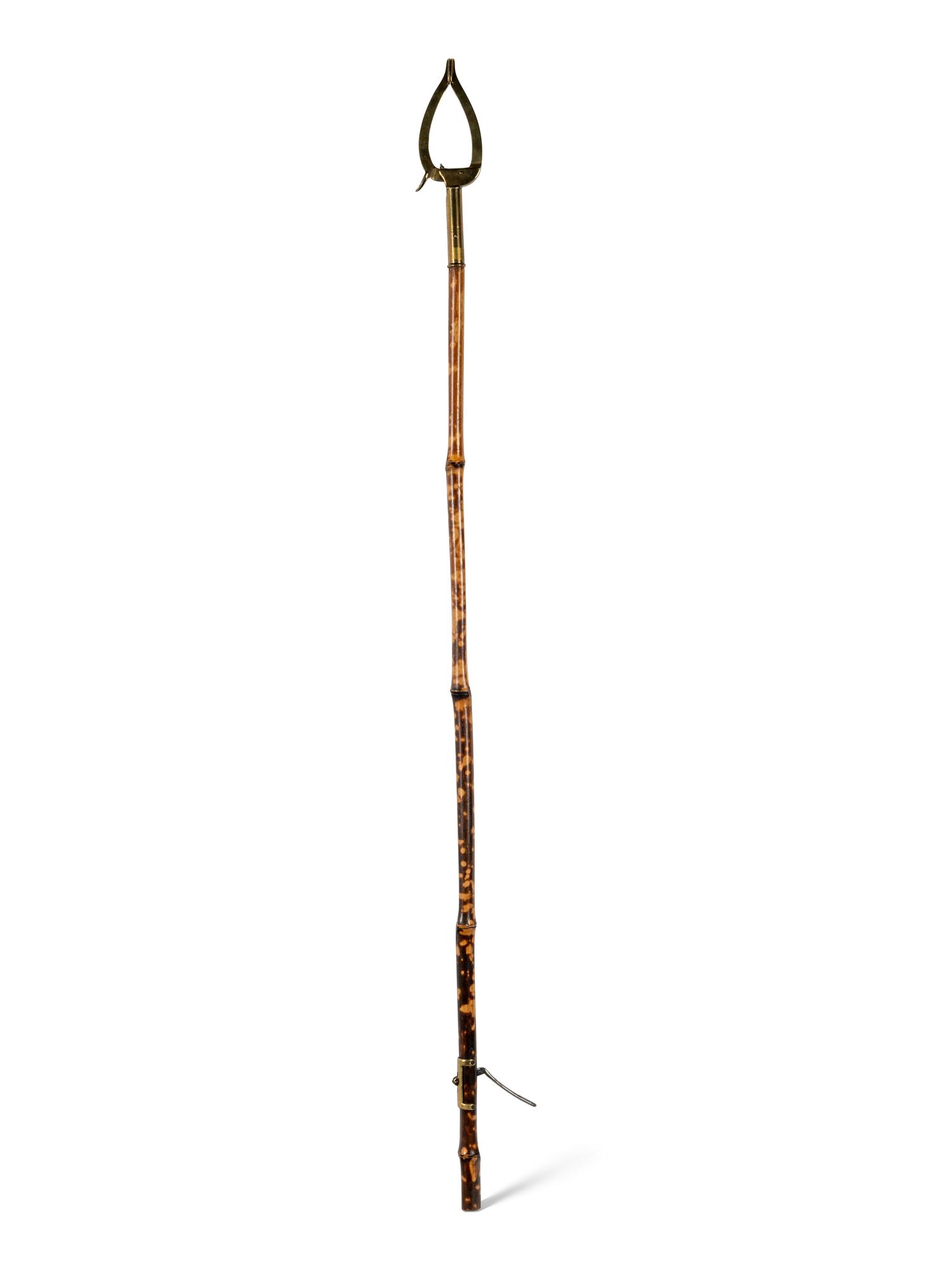 A Victorian Brass Mounted Bamboo Reaching Clamp