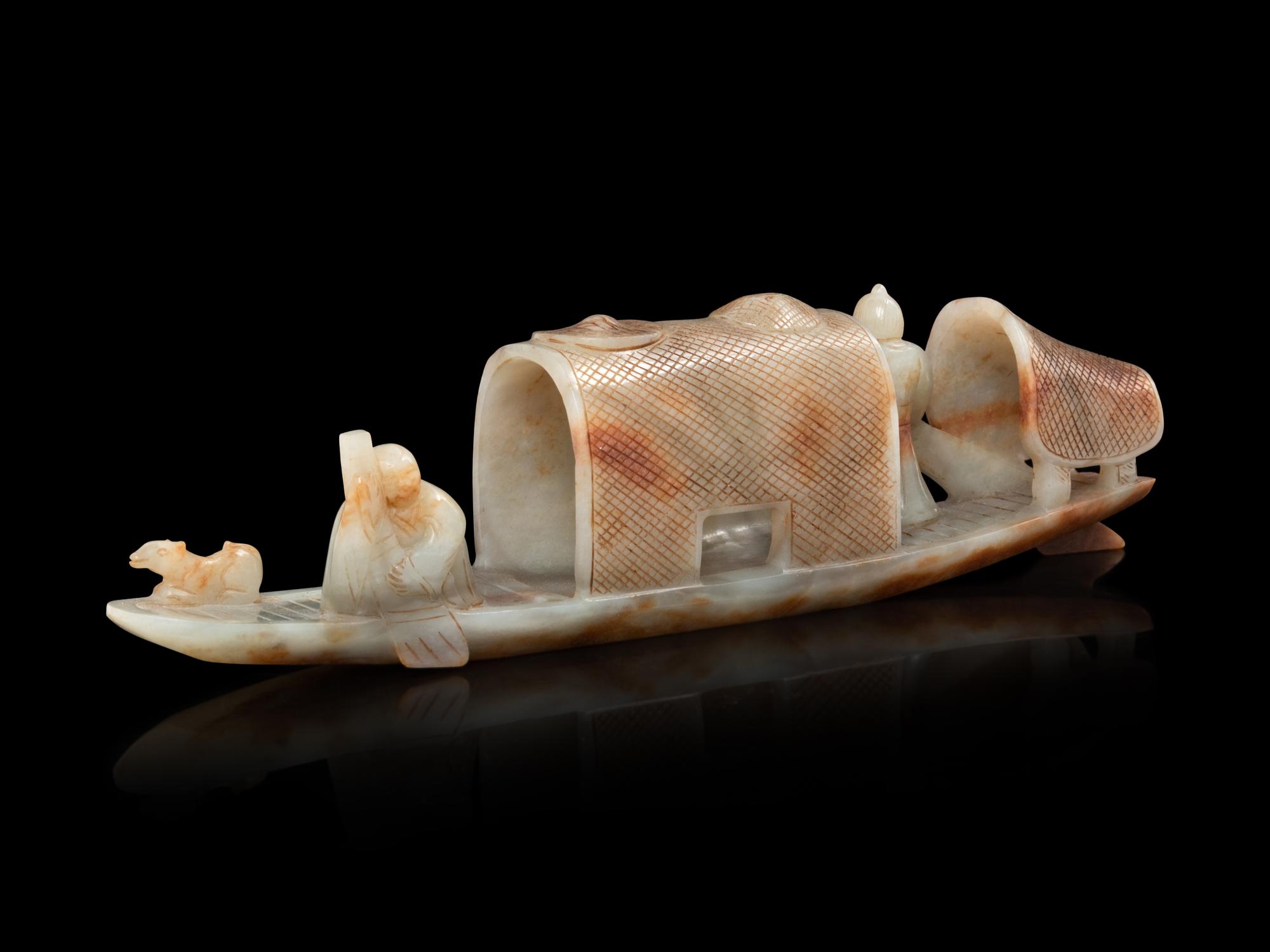 A Chinese Celadon and Russet Jade Boat
