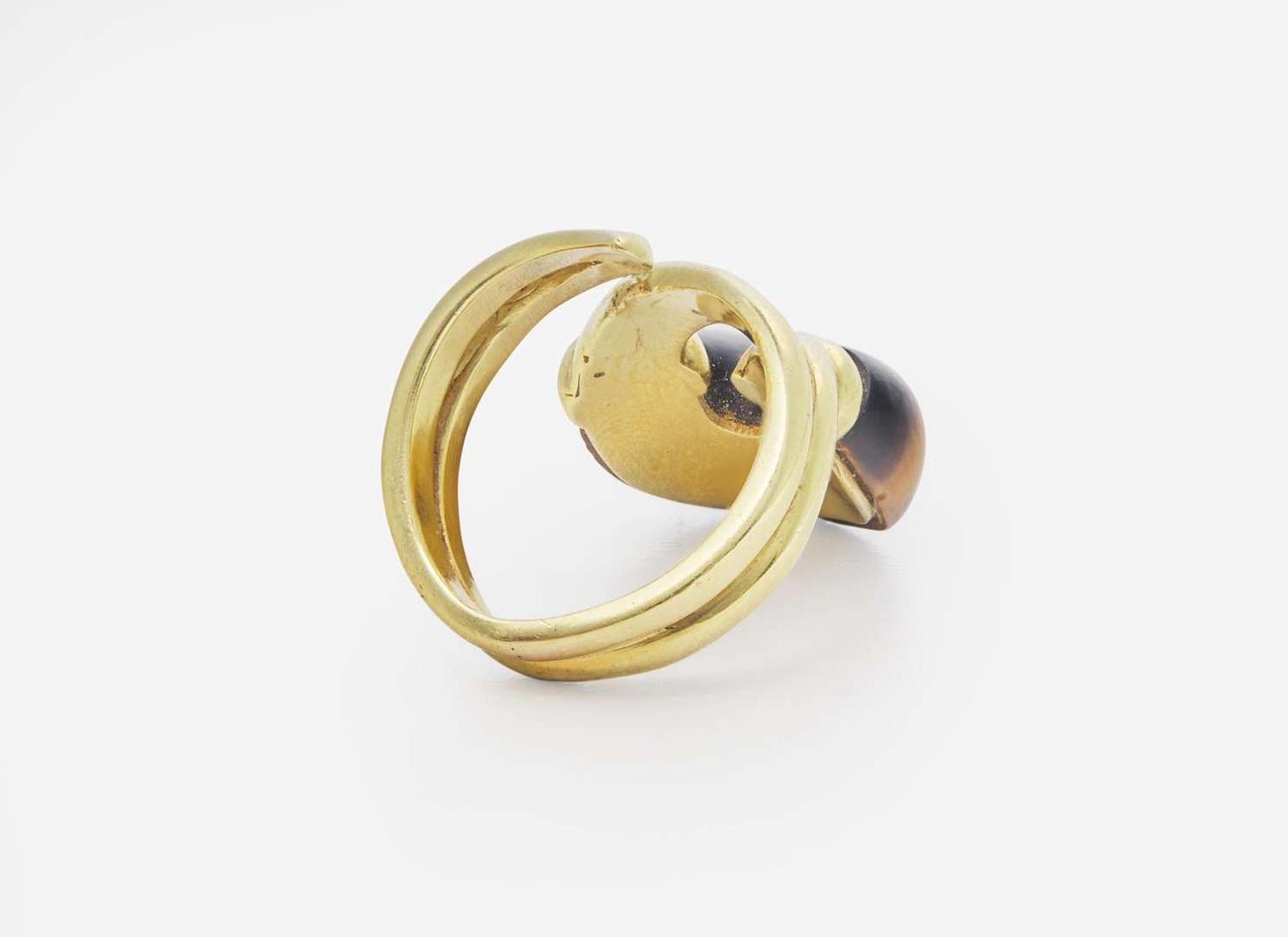 An 18K Yellow Gold and Tiger's Eye Ring