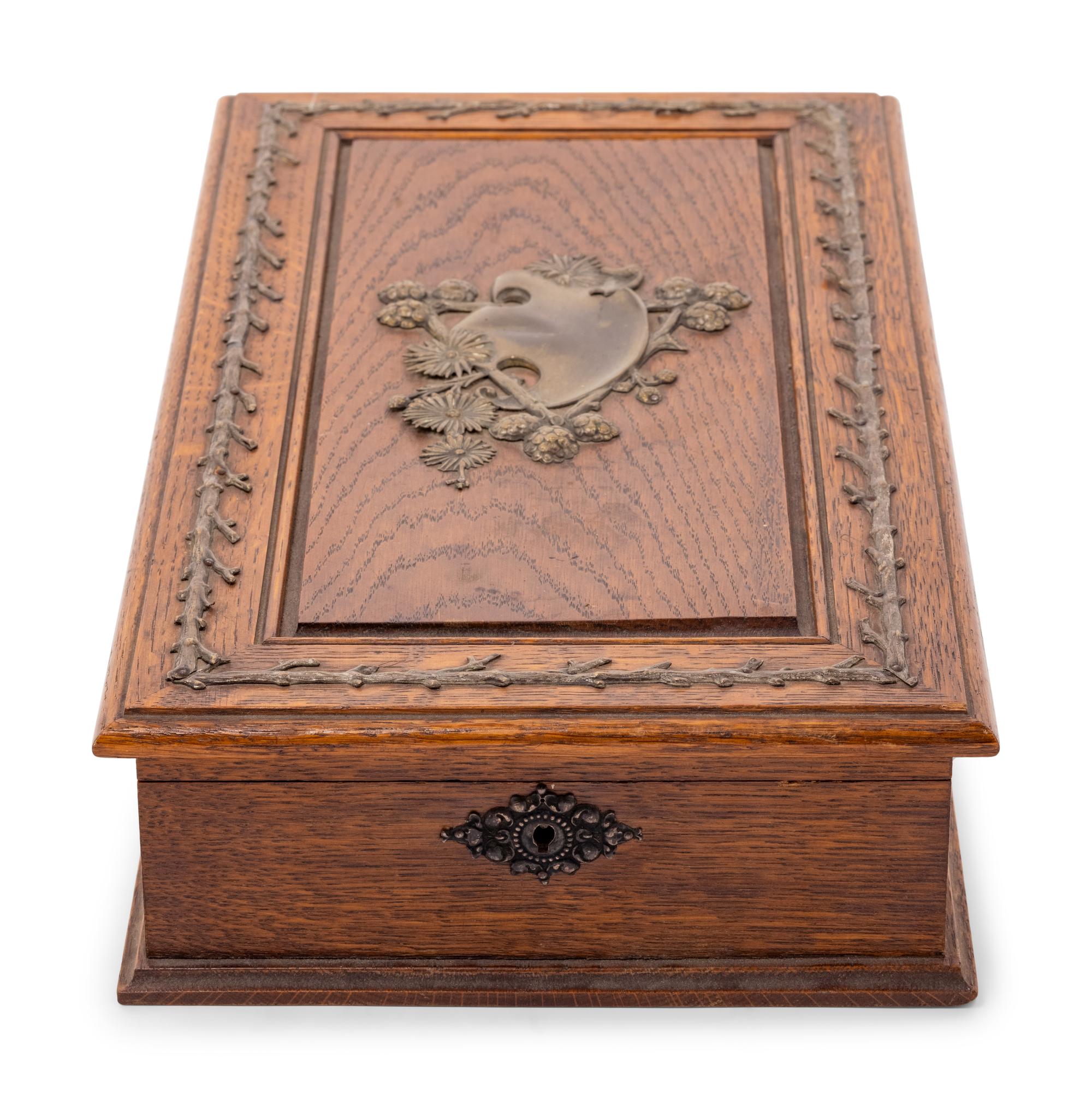 A Black Forest Gilt Metal Mounted Oak Box