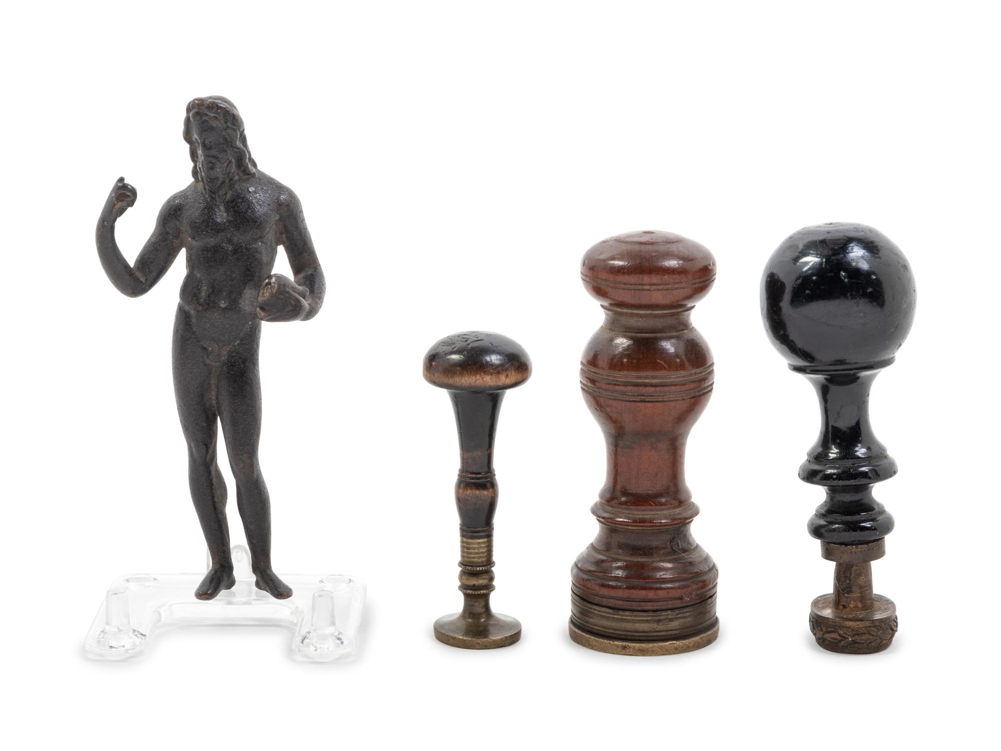 Three Continental Seals and a Bronze Figure