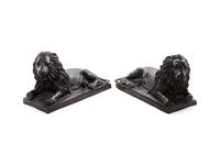 A Pair of Bronze Models of Recumbent Lions