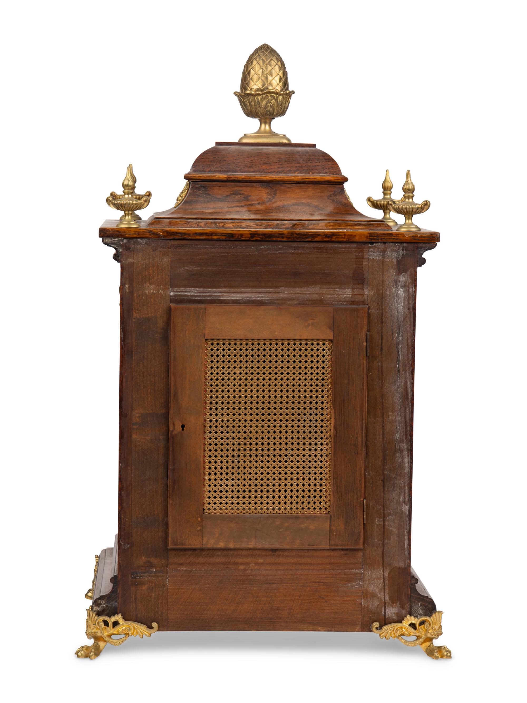 A George II Style Gilt Bronze Mounted Oak Bracket Clock