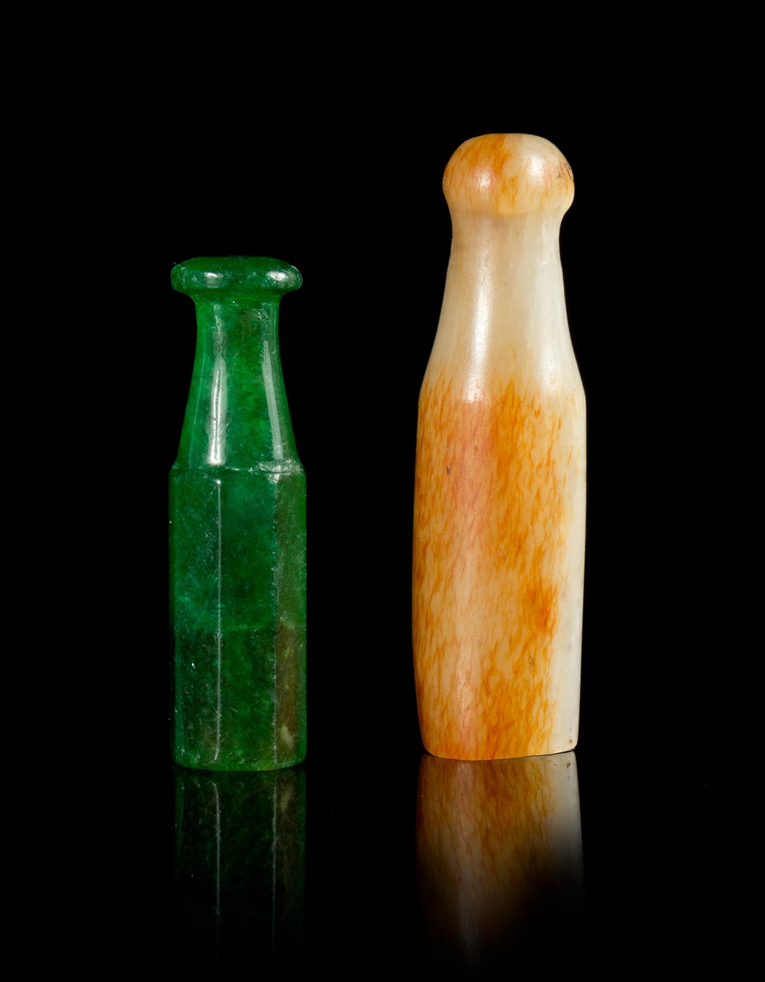 Two Carved Hardstone Cigarette Holders Length of larger 2 1/4 inches.