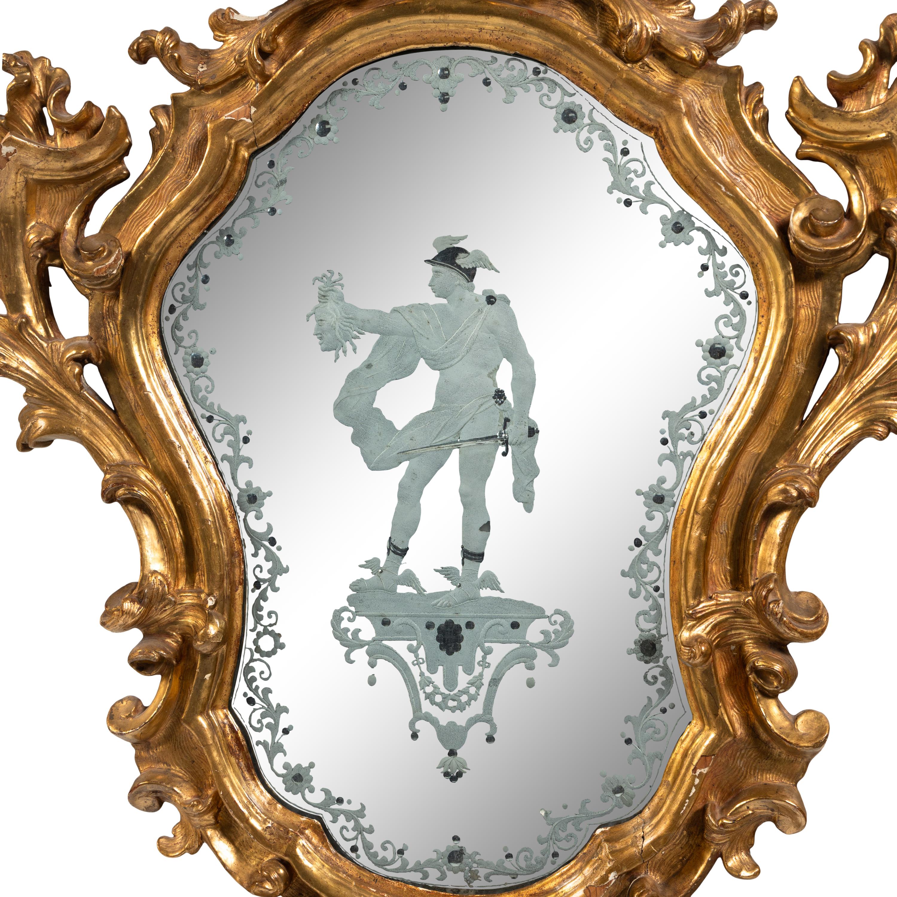 An Italian Baroque Style Giltwood and Etched Glass Mirror