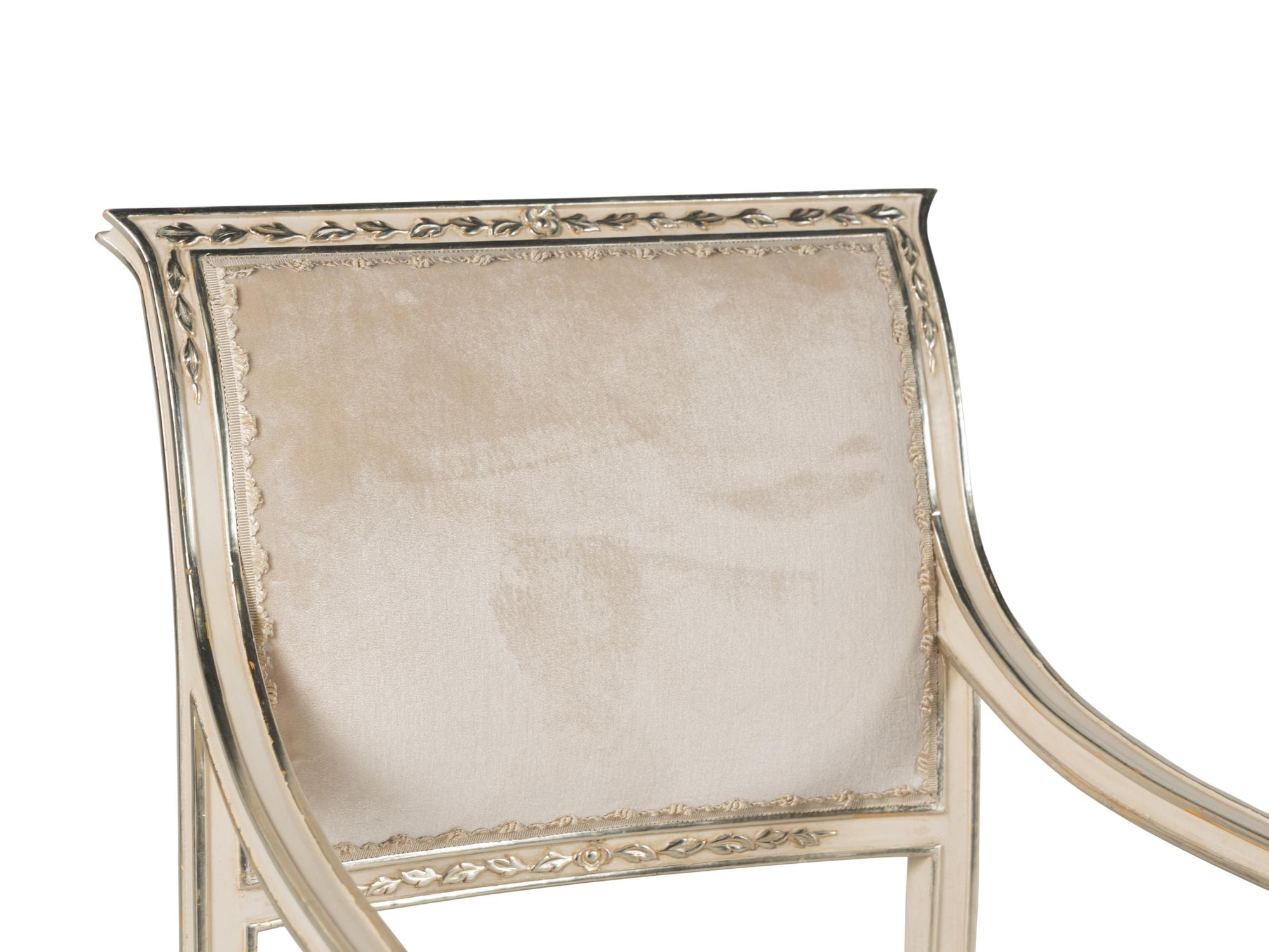 A Set of Ten Dennis and Leen Painted and Parcel Gilt Dining Chairs