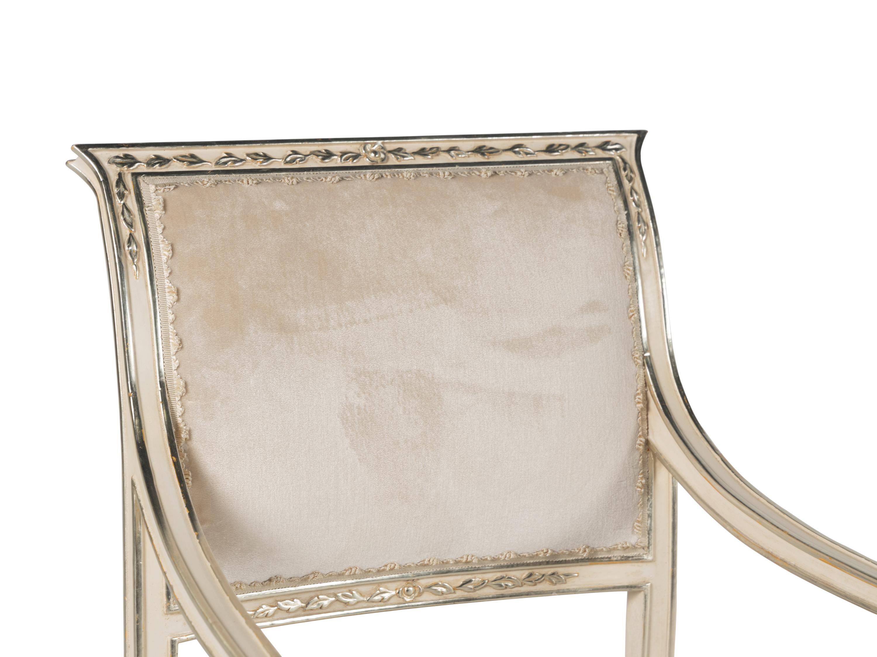 A Set of Ten Dennis and Leen Painted and Parcel Gilt Dining Chairs