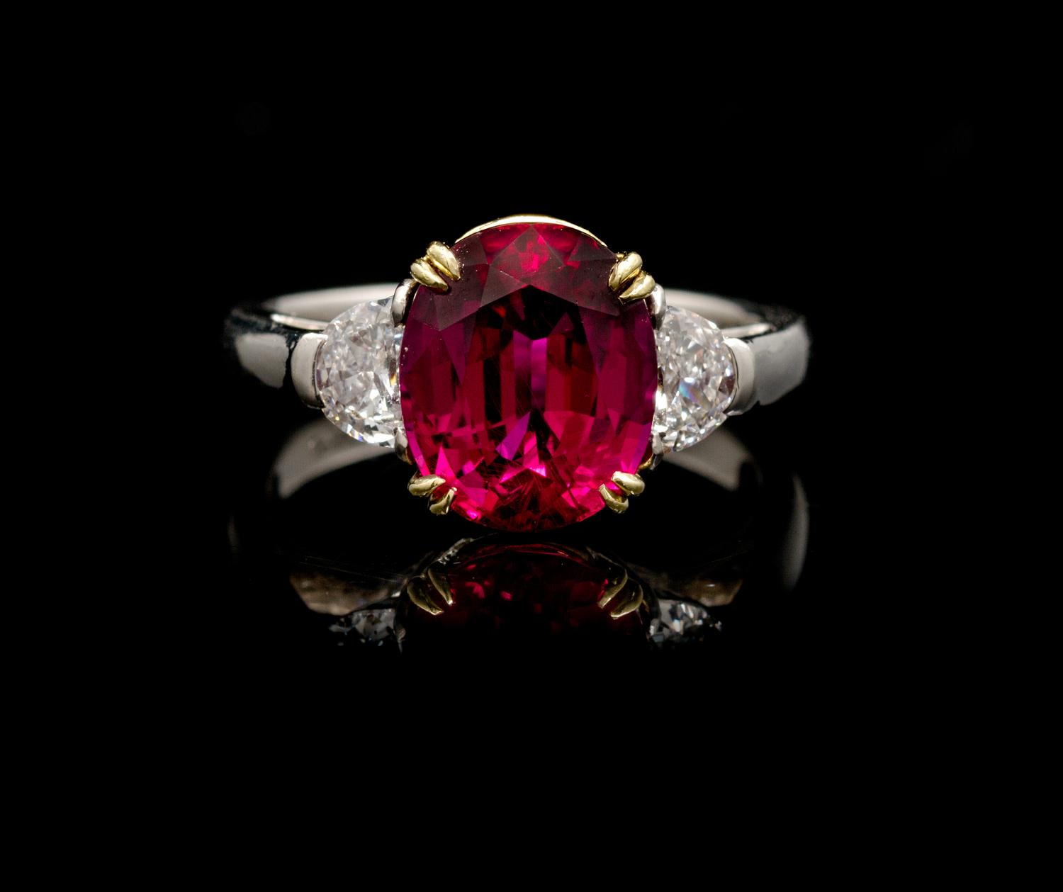 A Platinum, Yellow Gold, Ruby and Diamond Ring, 4.60 dwts.