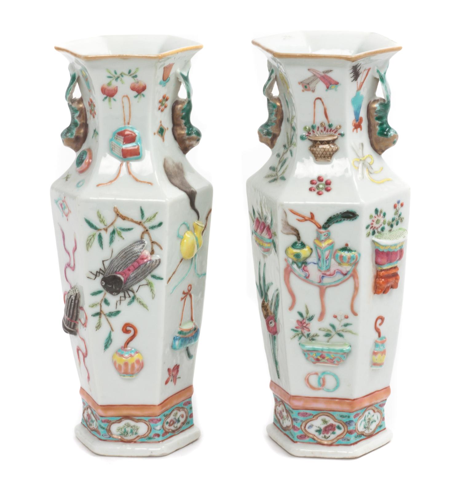 A Pair of Chinese Famille Rose Porcelain Vases Height 9 1/2 inches.