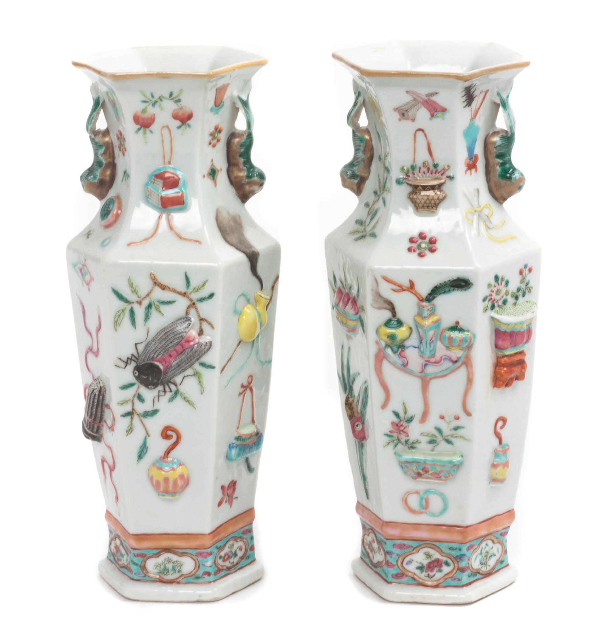 A Pair of Chinese Famille Rose Porcelain Vases Height 9 1/2 inches.