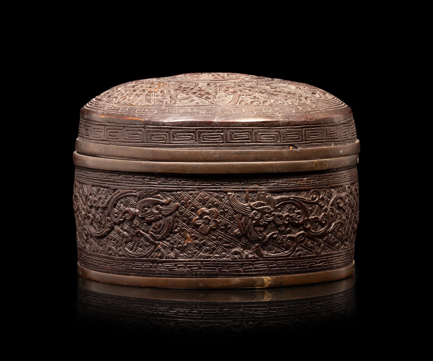 A Bronze Circular Box and Cover
