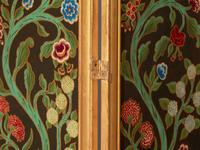 A Pair of Giltwood and Polychrome Painted Four-Panel Folding Screens DONATED BY DAVID KLEINBERG DESIGN ASSOCIATES
