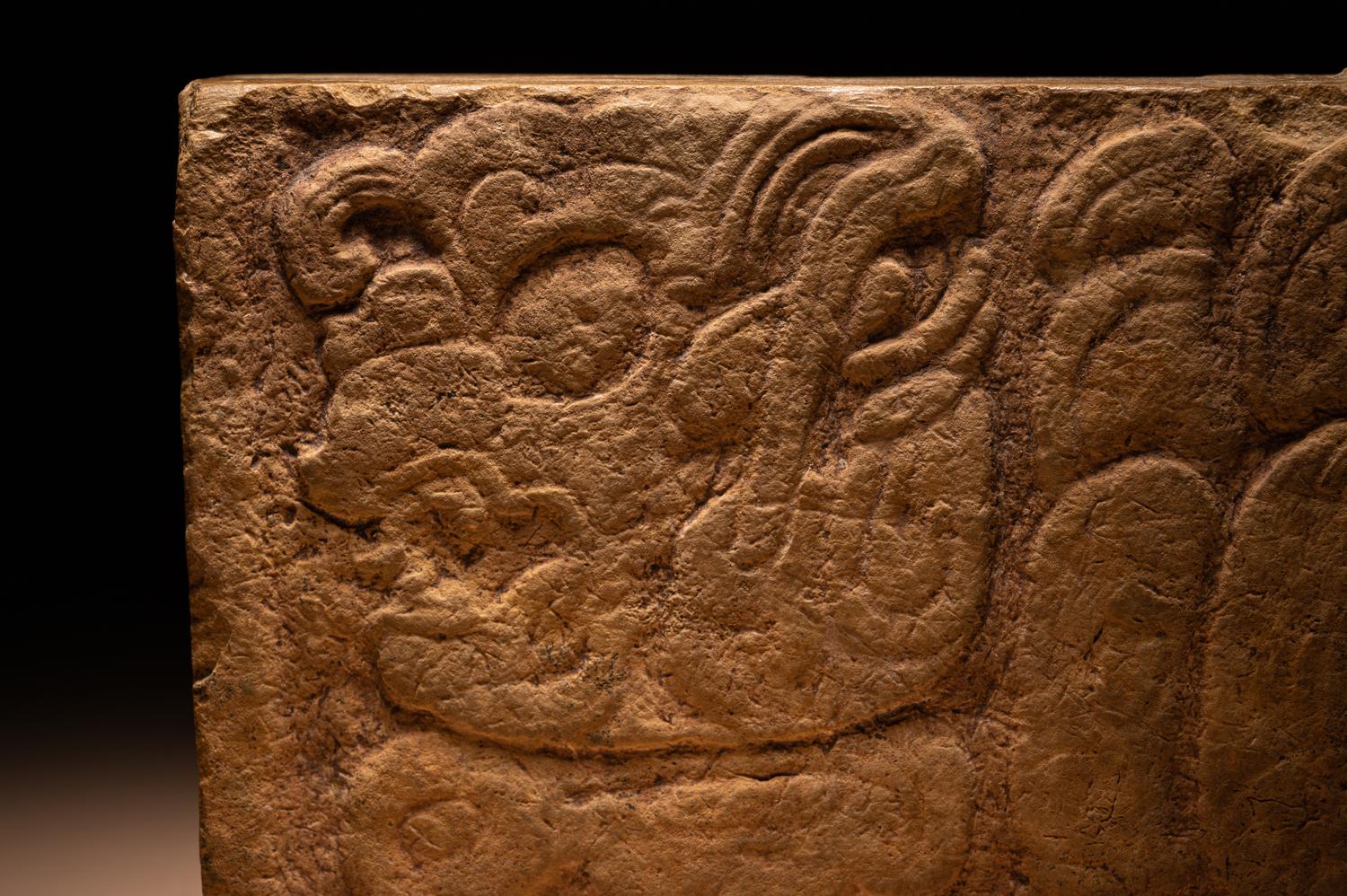 A Maya Limestone Panel with Glyphs