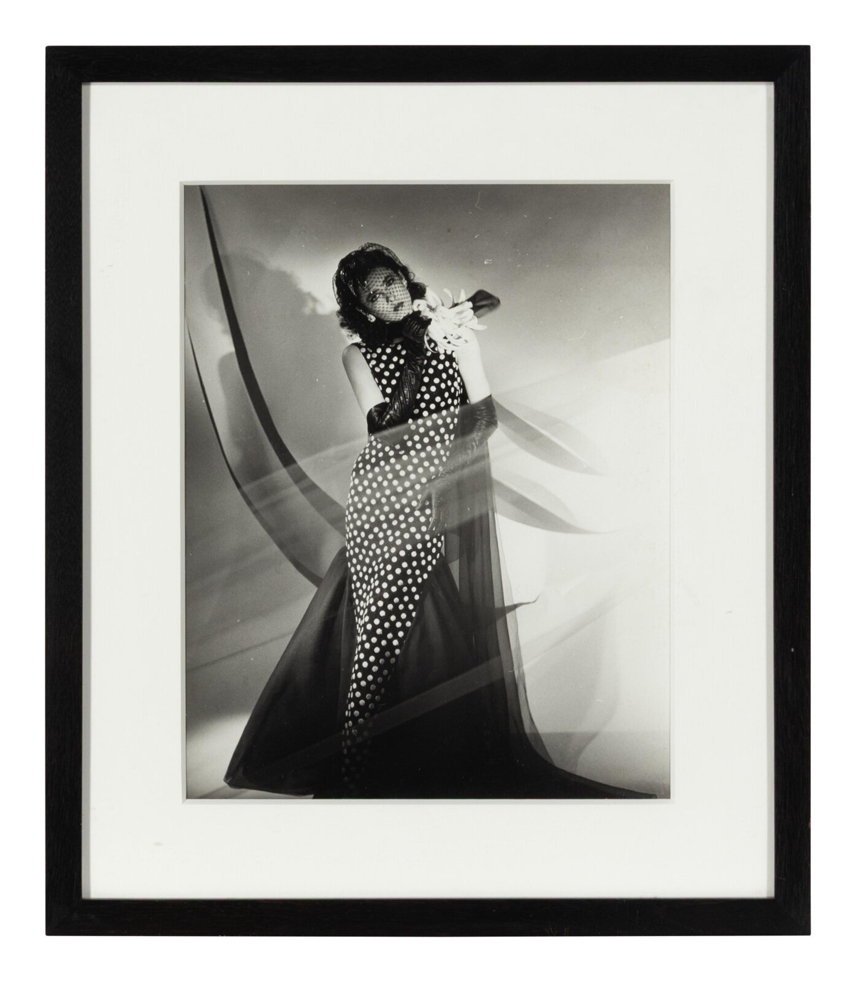 Four photographs depicting Dayle Haddon