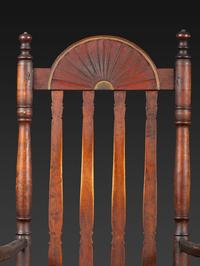A William and Mary Style Parcel Gilt and Red Painted, Fan-Carved Bannister Back Woven Splint Seat Armchair