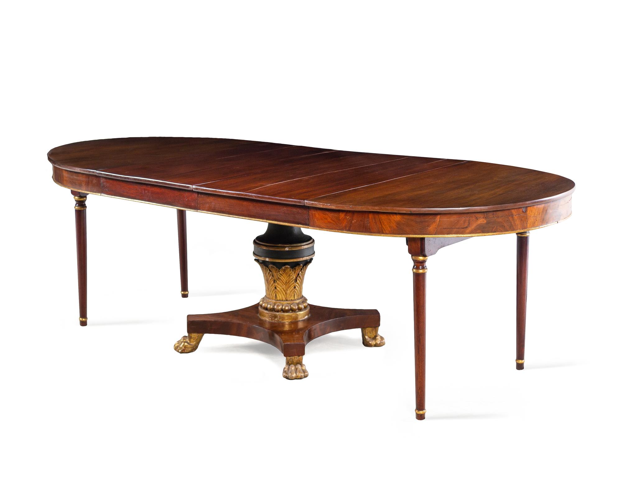 A Regency Style Painted and Parcel Gilt Mahogany Extension Dining Table