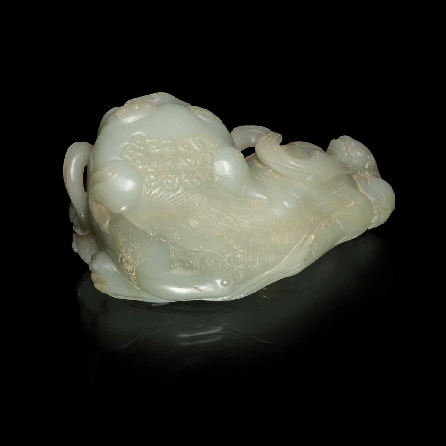 A Large Pale Celadon Jade Figure of a Fu Lion and Cub