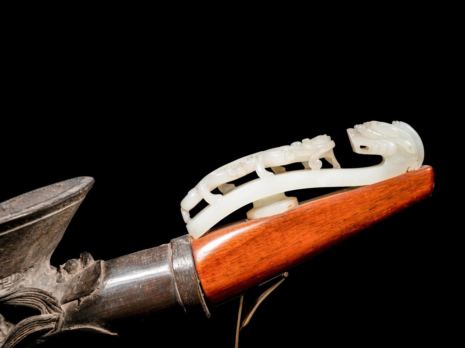 A Chinese White Jade Belt Hook-Mounted Iron