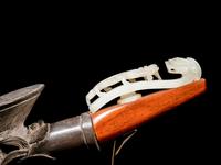 A Chinese White Jade Belt Hook-Mounted Iron