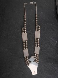 Sterling Silver and Coral Figural Necklace