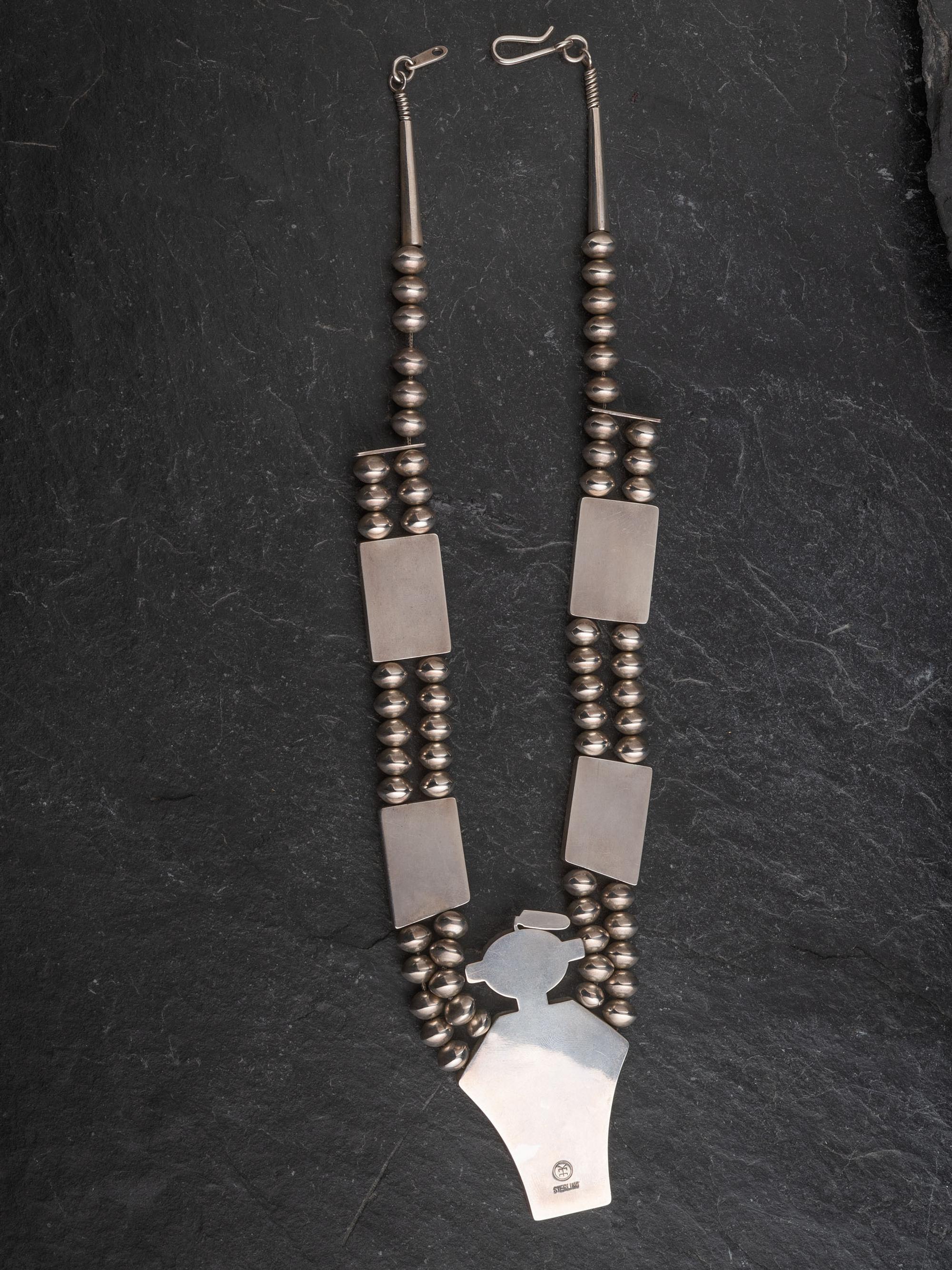 Sterling Silver and Coral Figural Necklace