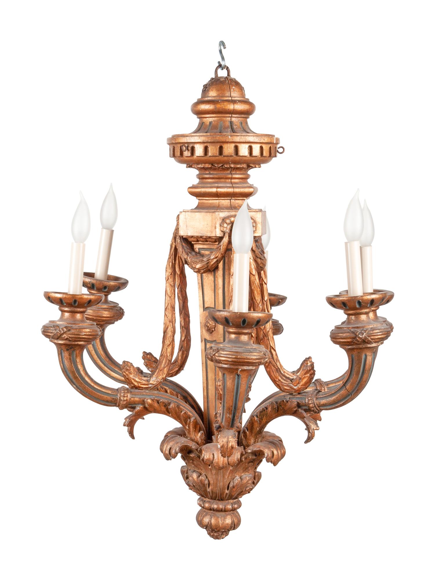 An Italian Baroque Style Giltwood Six-Light Chandelier