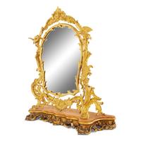 A Rococo Revival Gilt Bronze and Giltwood Dressing Mirror