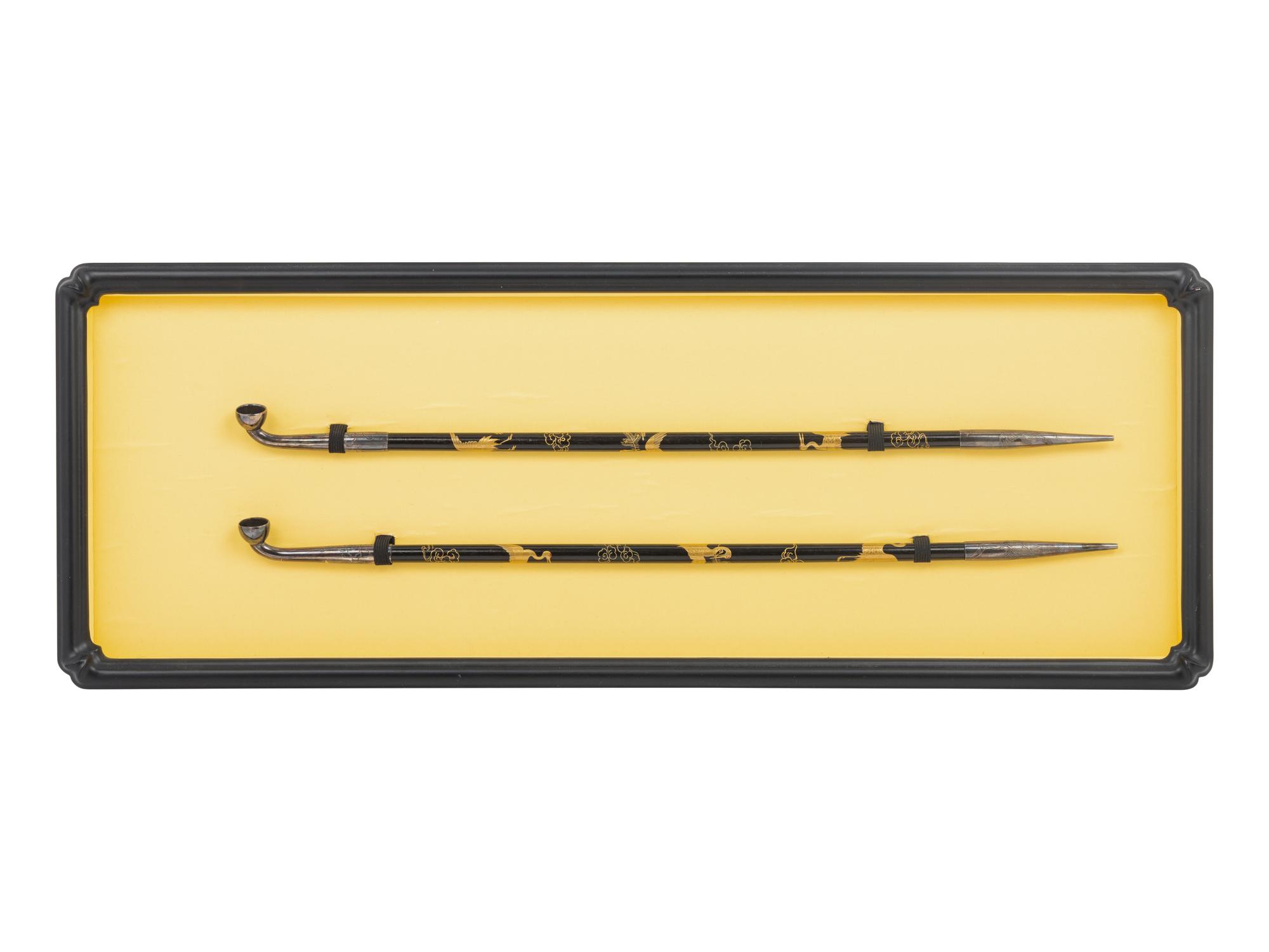 Two Japanese Silver and Lacquered Wood Pipes