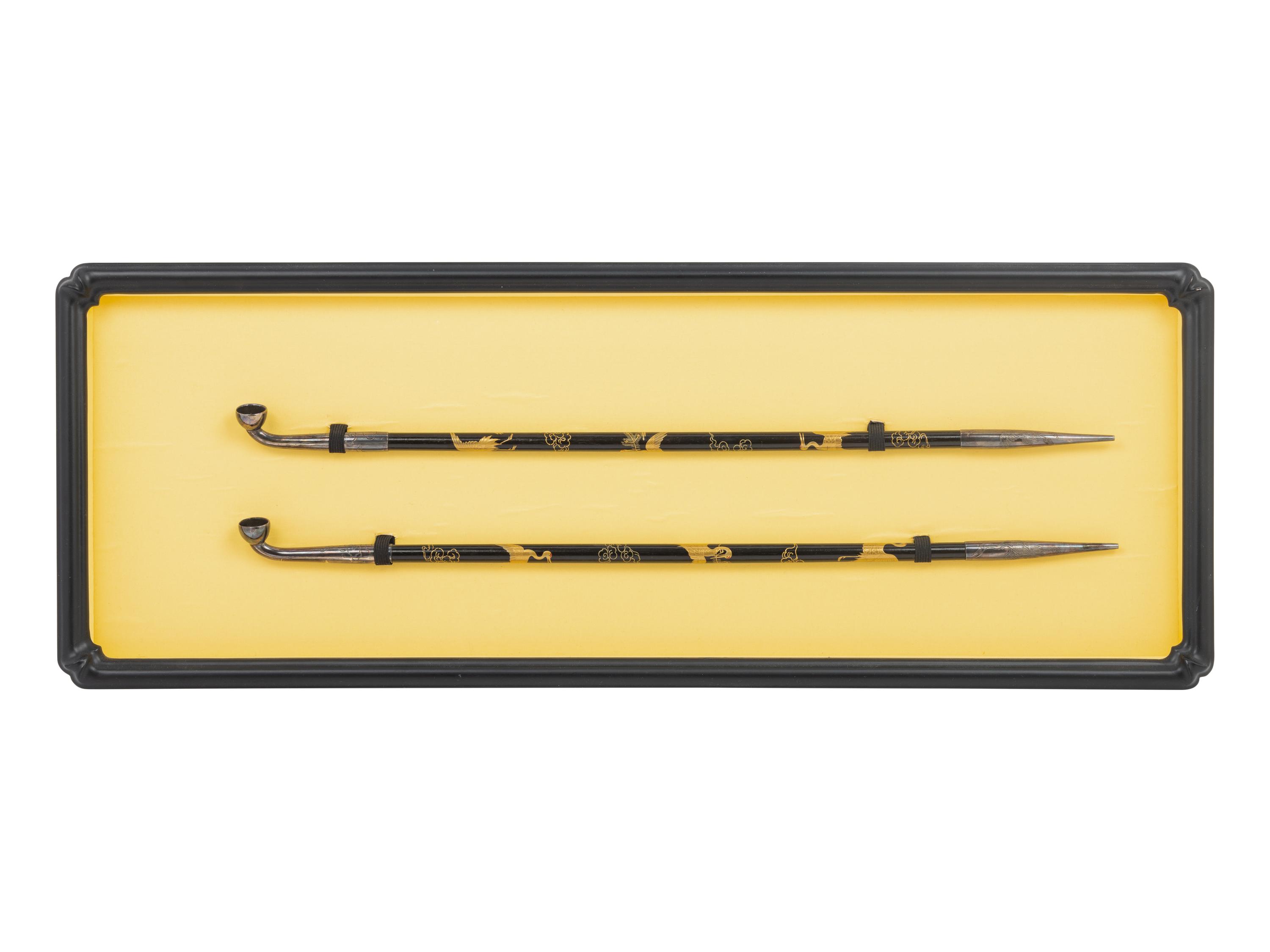 Two Japanese Silver and Lacquered Wood Pipes
