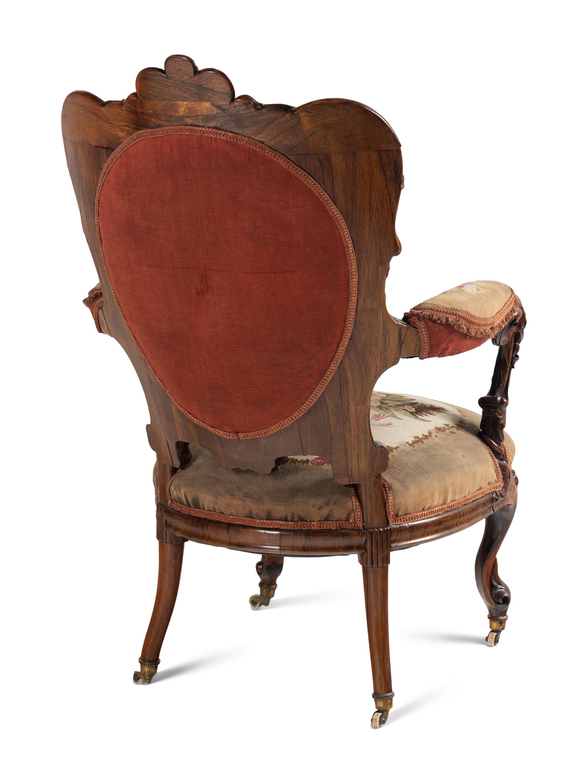 A Pair of Rococo Revival Carved Rosewood Armchairs